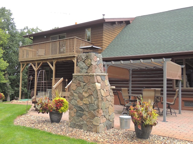 20578 317th St, Farming Twp, MN 56310 - back of property featuring stairs, a patio, a shingled roof, and a deck