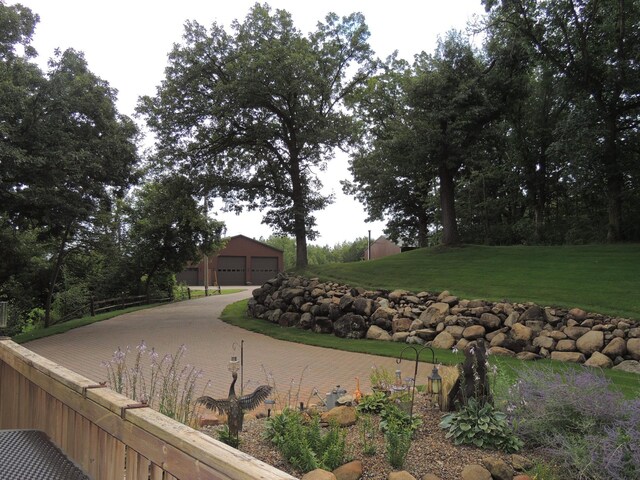 20578 317th St, Farming Twp, MN 56310 - view of yard featuring an outbuilding and a garage