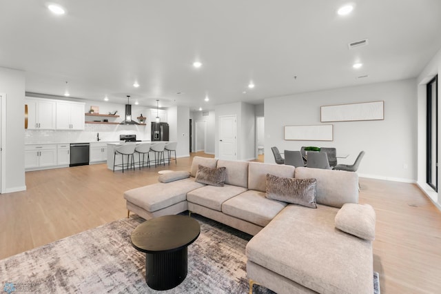 living room featuring light hardwood / wood-style flooring