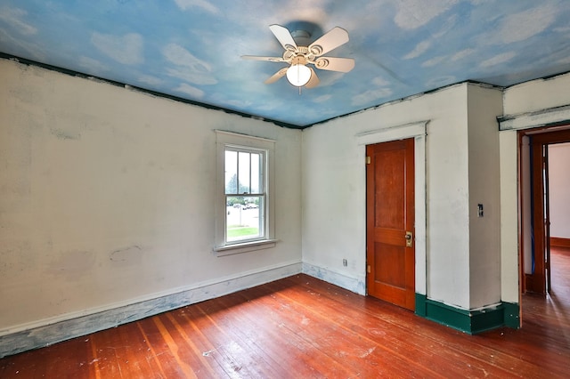 unfurnished bedroom featuring ceiling fan and hardwood / wood-style flooring