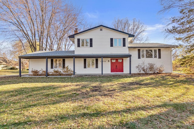 split level home with a front yard