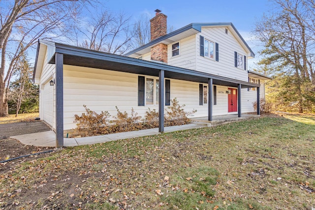 view of front facade with covered porch and a garage