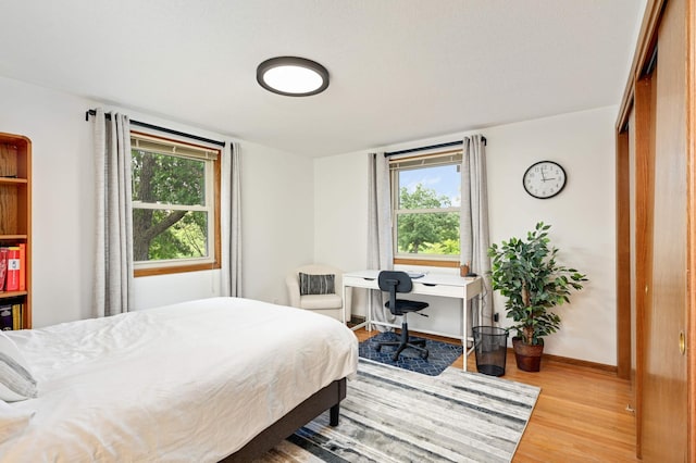 bedroom featuring light hardwood / wood-style floors