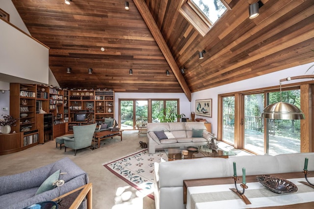 living room featuring carpet, wood ceiling, a skylight, high vaulted ceiling, and beam ceiling