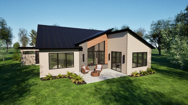 rear view of house with a patio area and a lawn