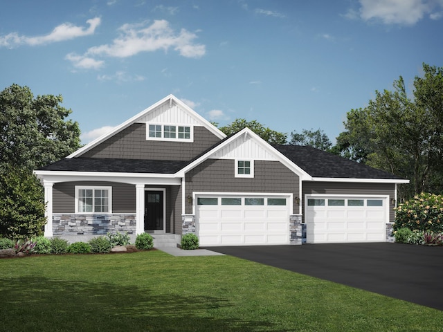 view of front facade featuring a garage and a front yard