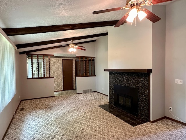 unfurnished living room with ceiling fan, a textured ceiling, lofted ceiling with beams, and dark carpet