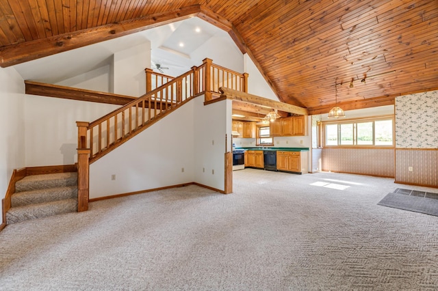 unfurnished living room featuring wood ceiling, light colored carpet, high vaulted ceiling, and ceiling fan with notable chandelier