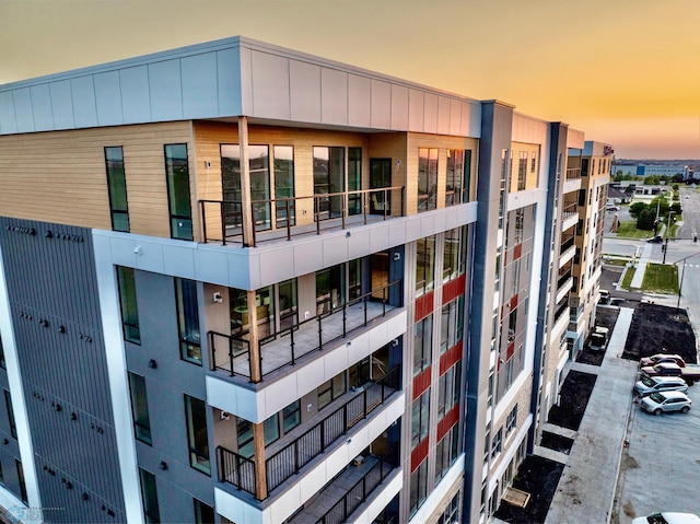 view of outdoor building at dusk