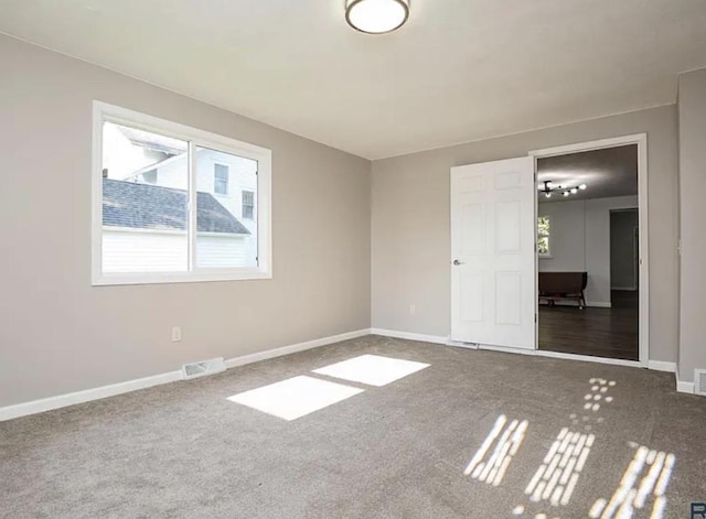 view of carpeted spare room