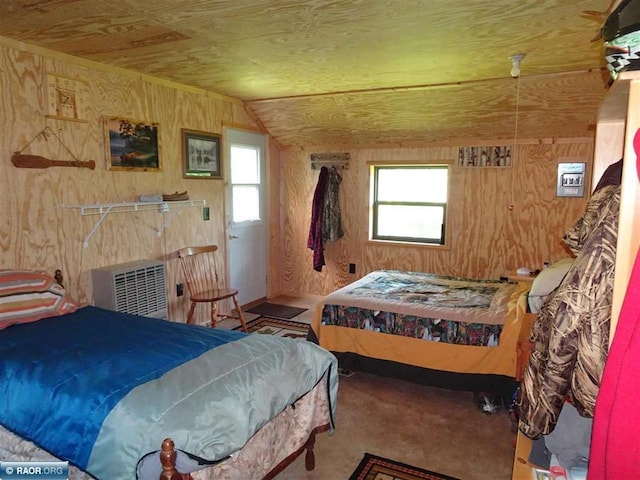 carpeted bedroom featuring wood walls, lofted ceiling, and wood ceiling