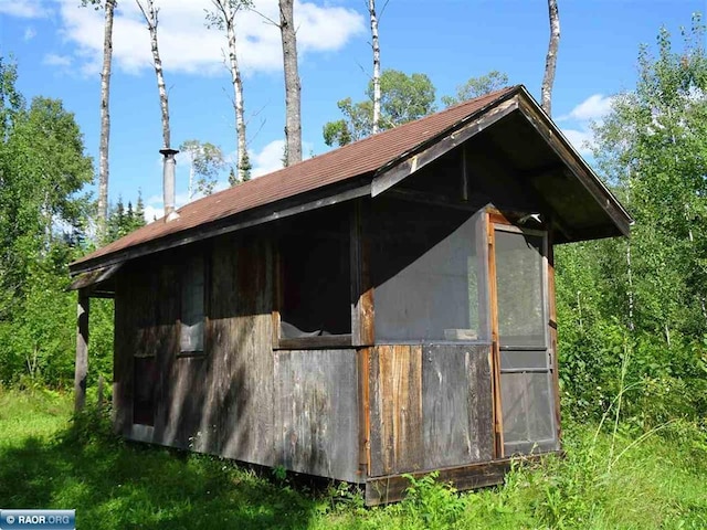 view of horse barn featuring an outdoor structure