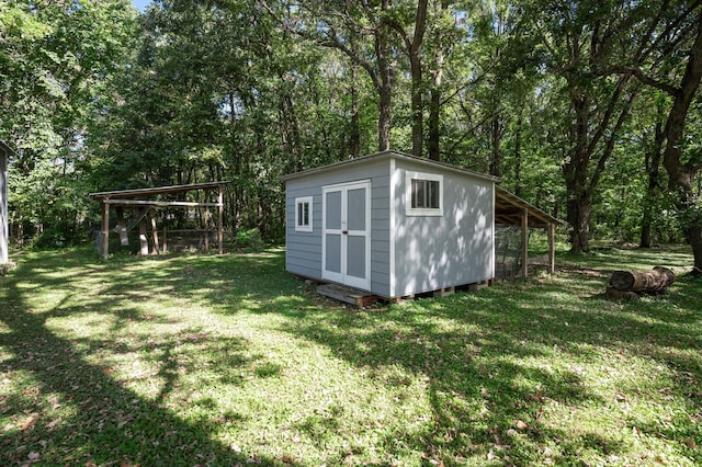 2894 115th Ave, Greenbush Twp, MN 55371 - view of shed with view of wooded area