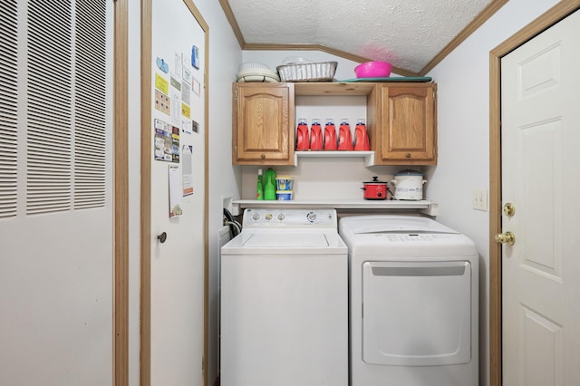 2894 115th Ave, Greenbush Twp, MN 55371 - washroom with a heating unit, cabinet space, ornamental molding, washing machine and clothes dryer, and a textured ceiling