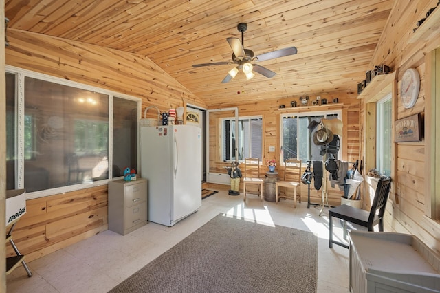 2894 115th Ave, Greenbush Twp, MN 55371 - interior space with wooden walls, vaulted ceiling, wooden ceiling, ceiling fan, and tile patterned floors