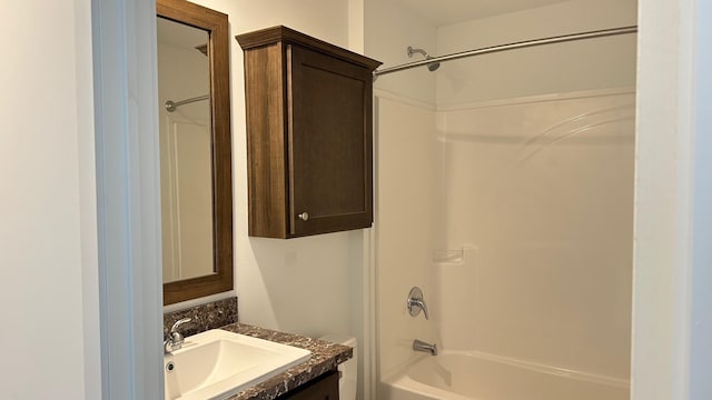 bathroom featuring vanity and shower / bath combination