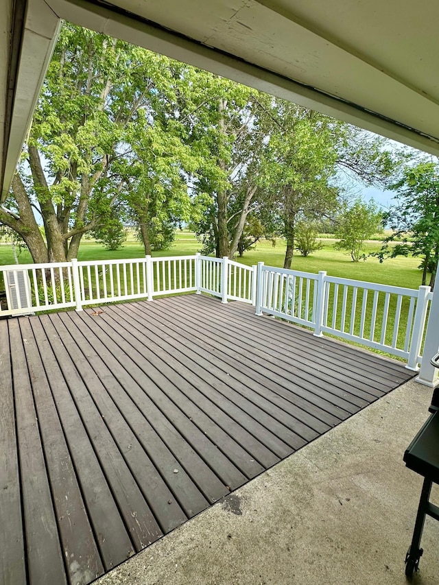 deck featuring a lawn