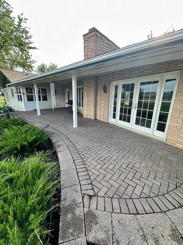 back of house with a patio