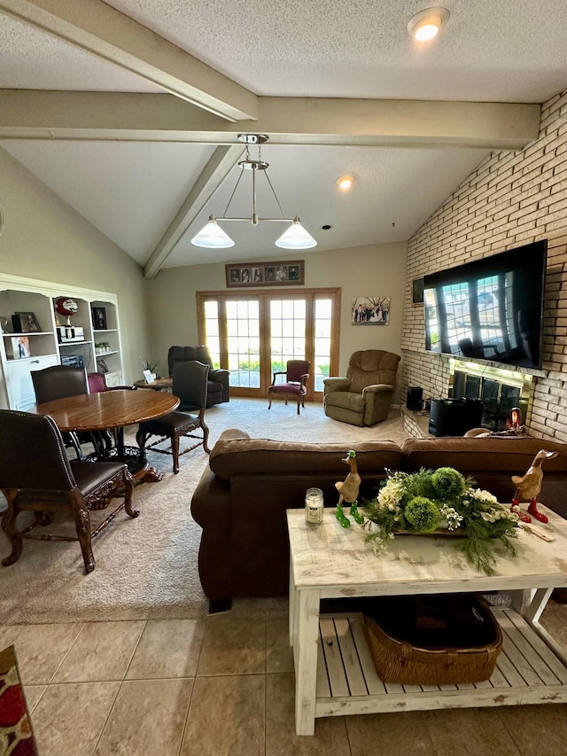 living room with tile patterned floors, a textured ceiling, lofted ceiling with beams, and brick wall