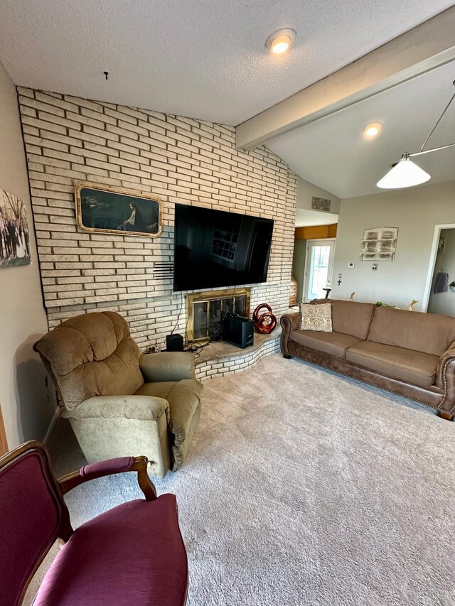 living room with brick wall, a brick fireplace, a textured ceiling, carpet floors, and lofted ceiling with beams