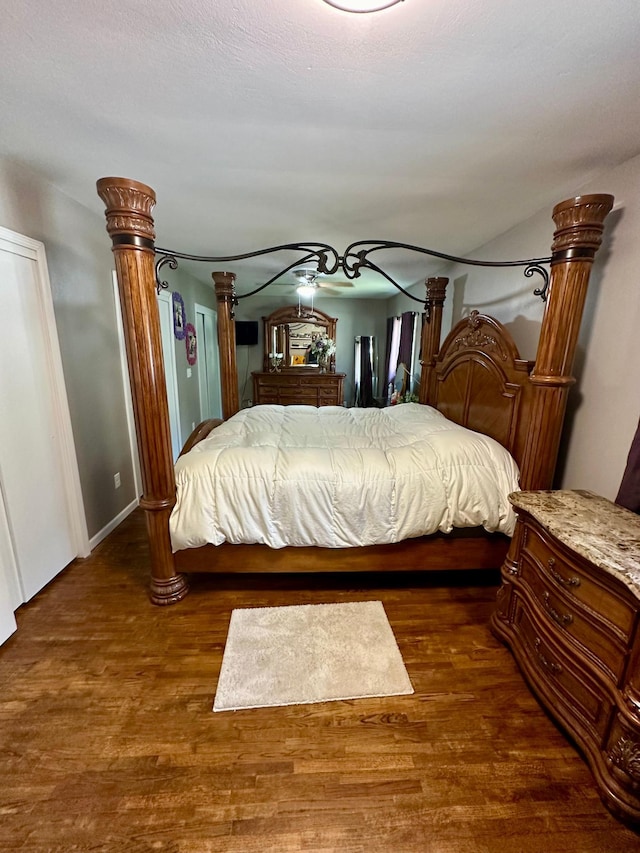 bedroom with hardwood / wood-style floors