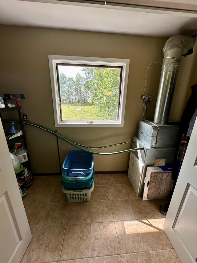 washroom featuring light tile patterned flooring