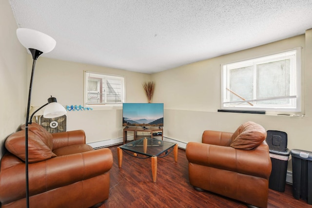 living room with a baseboard radiator, a textured ceiling, and dark hardwood / wood-style flooring