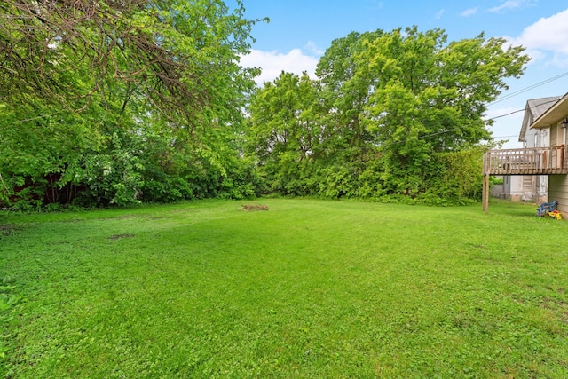 view of yard with a deck