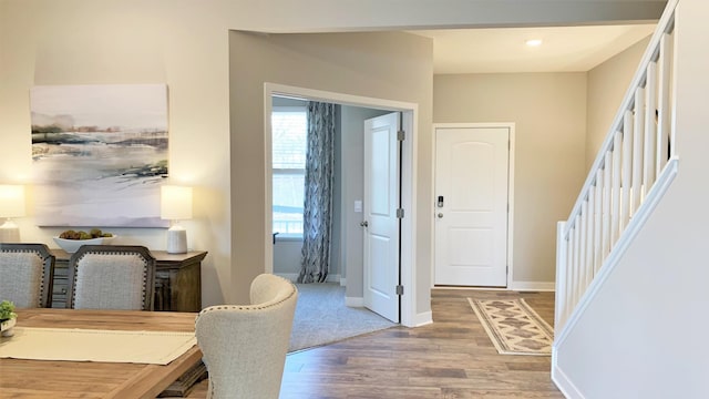 foyer entrance with hardwood / wood-style floors