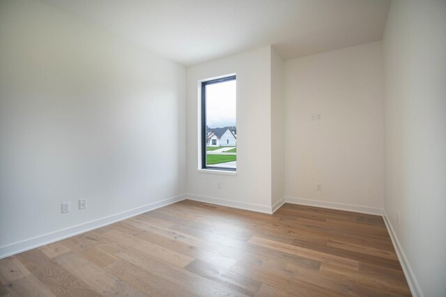 empty room featuring light hardwood / wood-style floors