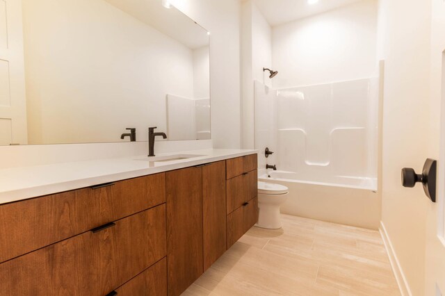 full bathroom with shower / bathtub combination, toilet, and vanity