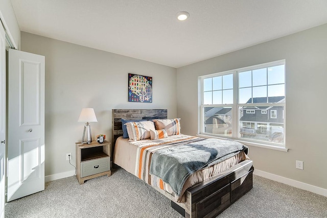 bedroom featuring carpet flooring