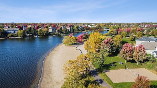 birds eye view of property featuring a view of the beach and a water view