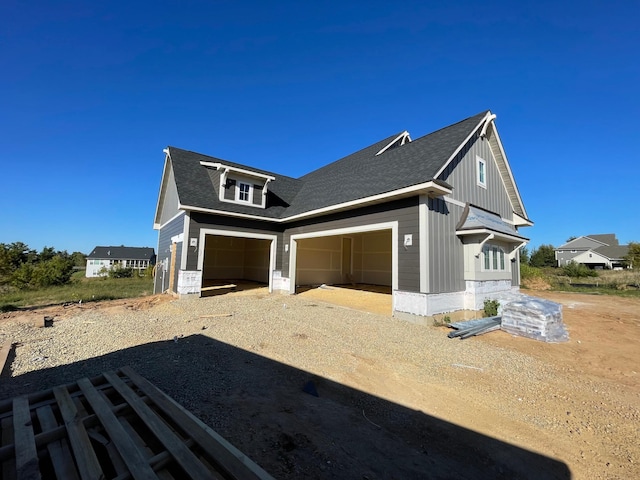 view of property exterior with a garage