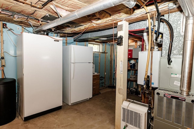 basement with white refrigerator