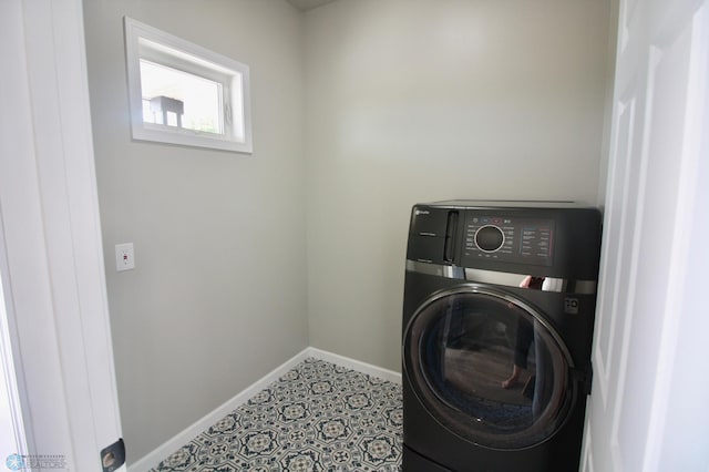 501 1st St NE, Hankinson, ND 58041 - laundry room featuring washer / dryer and baseboards