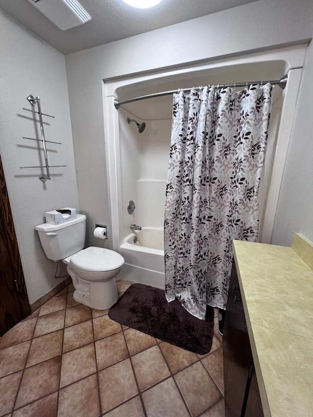 full bathroom featuring shower / bath combo, toilet, tile patterned flooring, and vanity