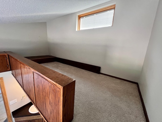 interior space featuring a textured ceiling