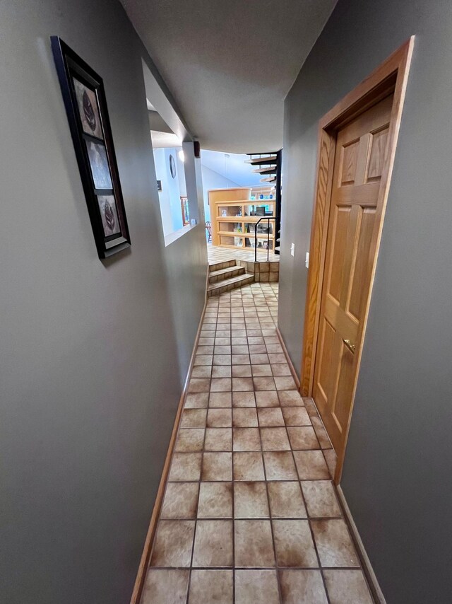 hallway with light tile patterned flooring