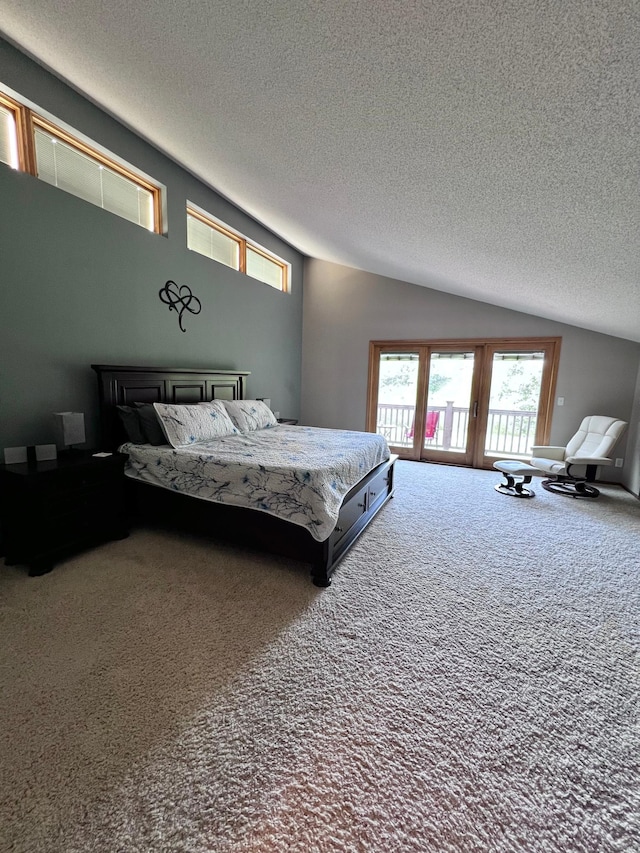 bedroom featuring access to outside, vaulted ceiling, carpet, and a textured ceiling