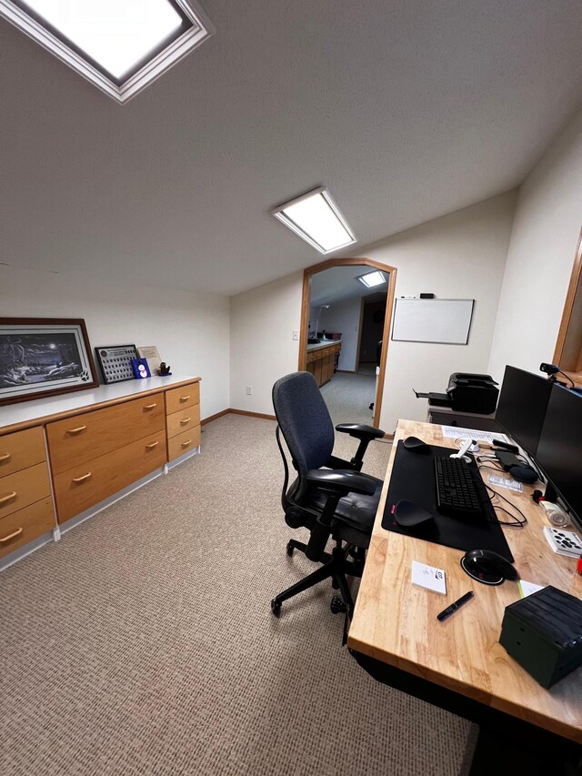 office space with light colored carpet