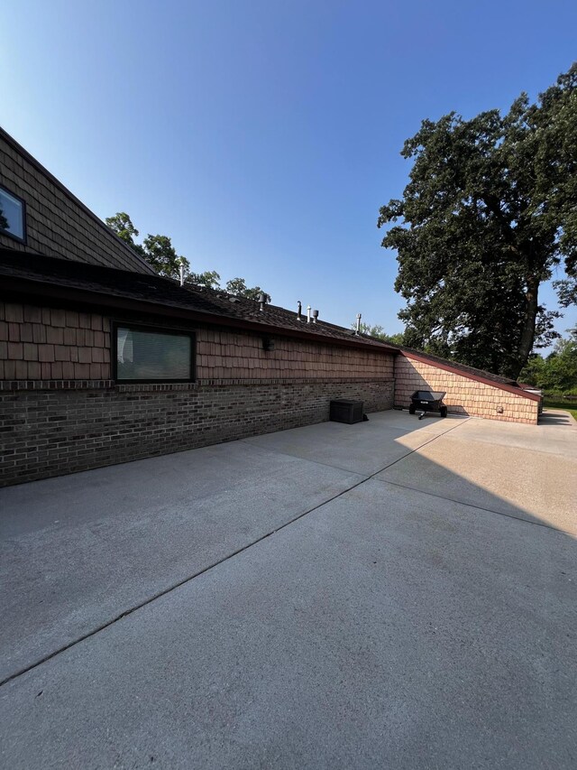 view of home's exterior featuring a patio