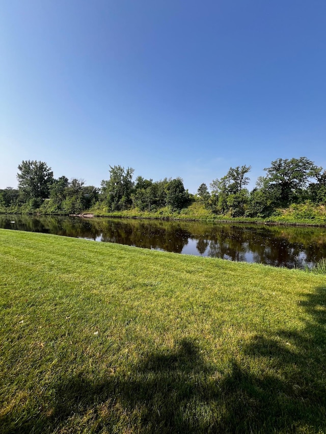 view of yard with a water view