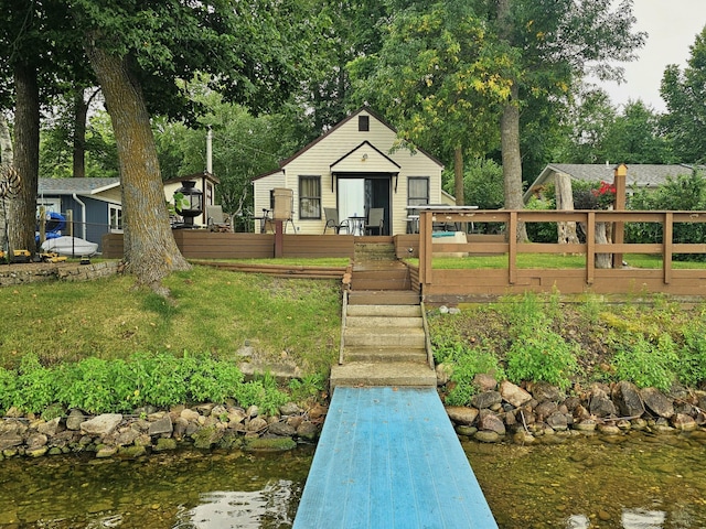 exterior space with a wooden deck and fence