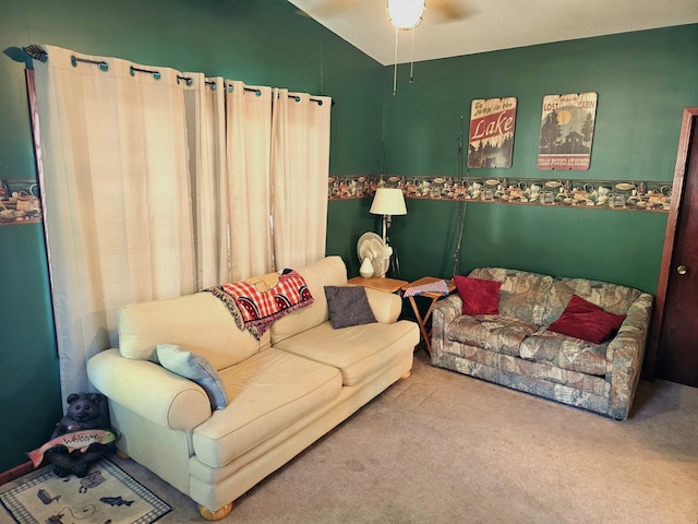 carpeted living room with vaulted ceiling