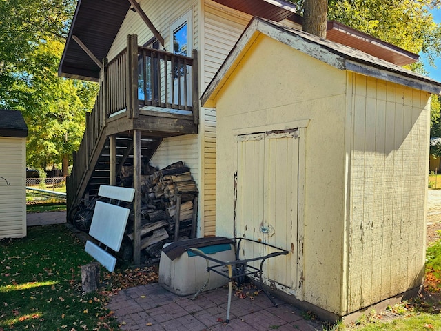 view of outbuilding with stairway