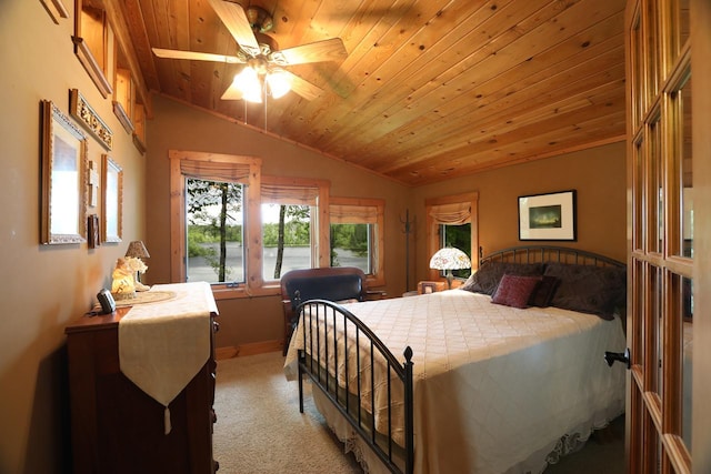 bedroom featuring ceiling fan, baseboards, light colored carpet, wooden ceiling, and lofted ceiling
