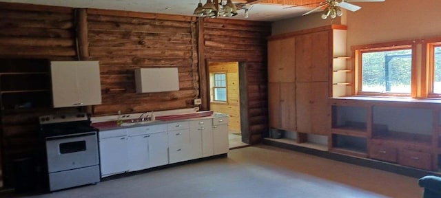 kitchen featuring log walls, white cabinetry, white electric range oven, ceiling fan, and sink