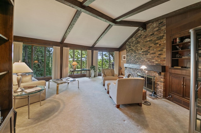 living room with lofted ceiling with beams, a brick fireplace, and light colored carpet