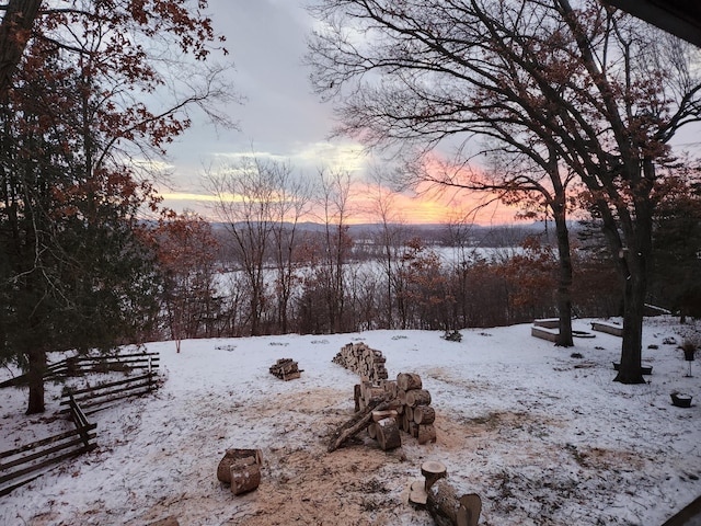 view of yard covered in snow